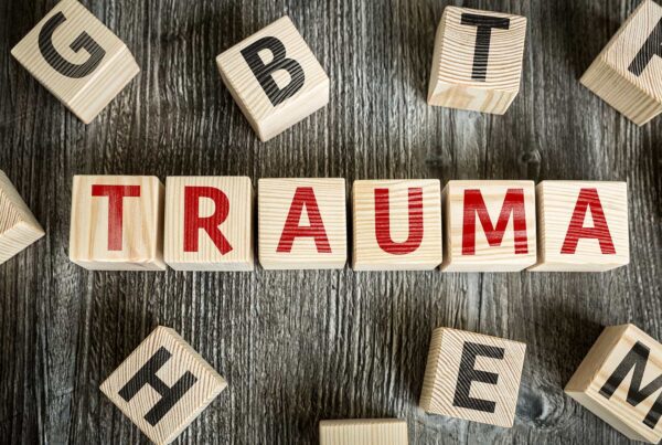 wooden blocks that spell trauma